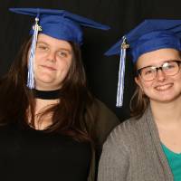 two people taking a picture together at GradFest